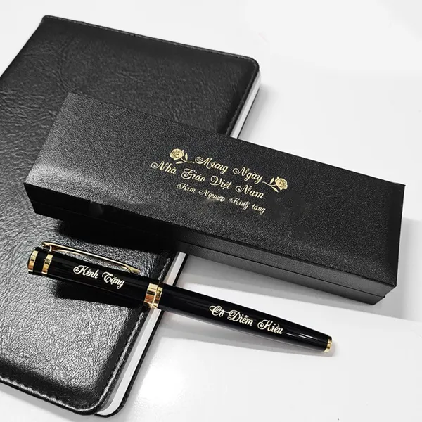 Bút ký B04V - Bút ký thân đen nắp mở, khoen tổ ong màu vàng (mực nước)